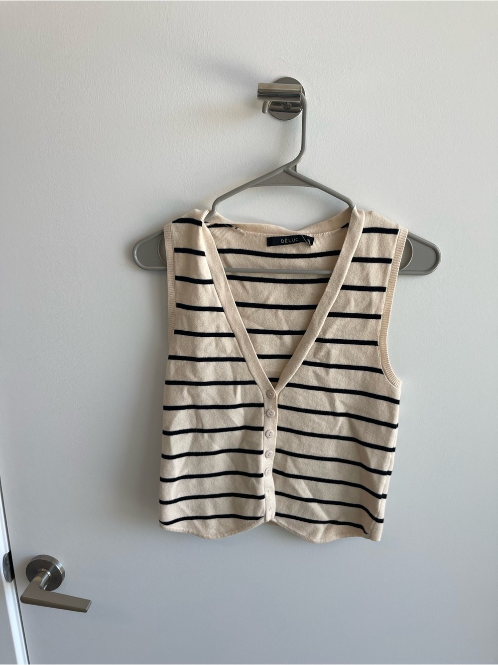 DELUC Cream and Black Striped Sleeveless Button Front Top